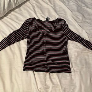 Black, red, and white long sleeve striped tee